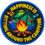 The words Happiness Is Sitting Around The Campfire in a circle around a camping tent and campfire.