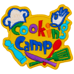 The words Cooking Camp are surrounded by cooking utensils and a chef's hat.