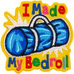The words I Made My Bedroll from a blue bedroll bag.