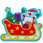 Santa sits in his red sleigh decorated with gold stars full of presents and a Christmas tree. 