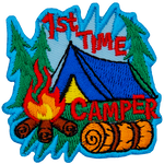 The words 1st Time Camper are around a blue tent and campfire.
