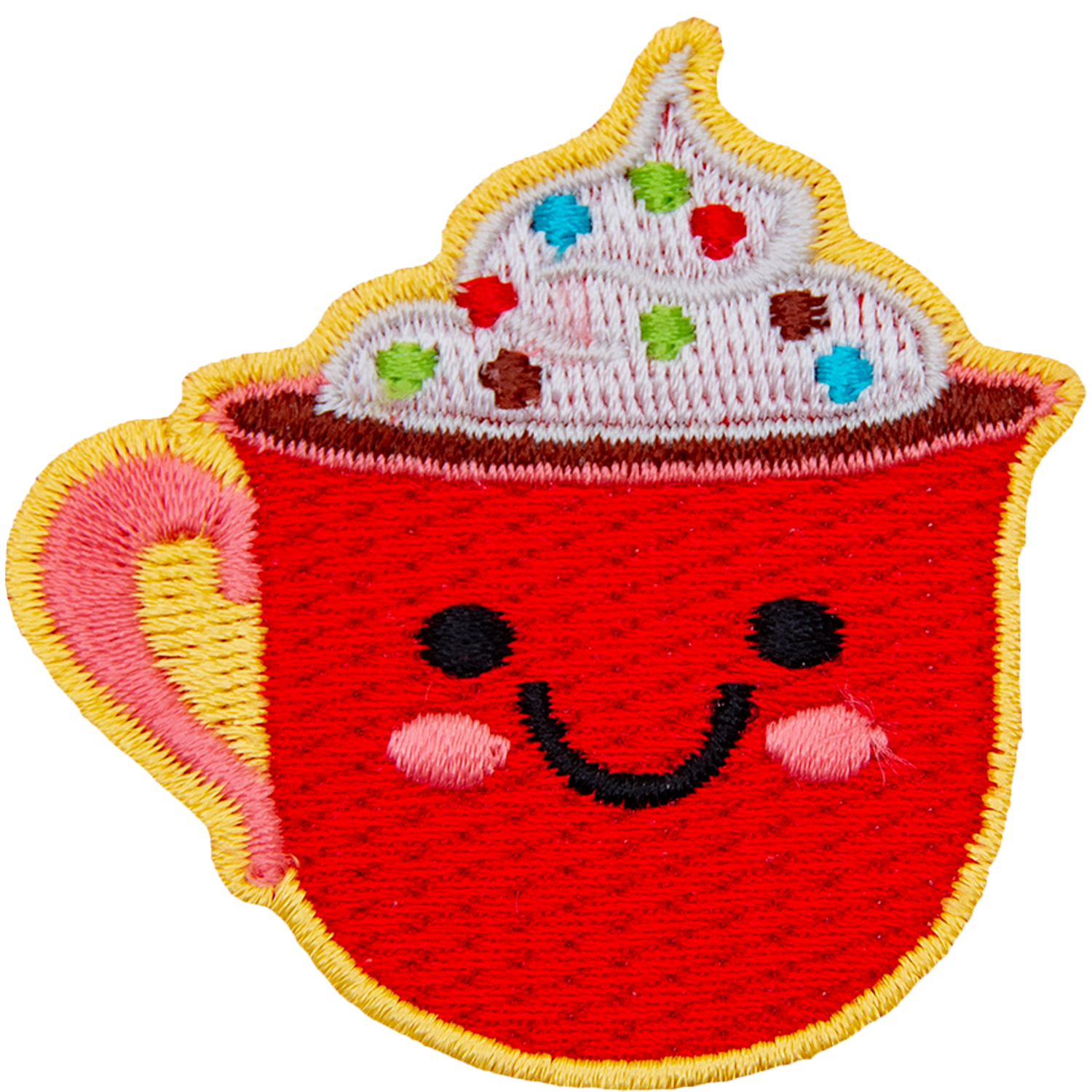 A red mug of cocoa is topped with whipped cream and sprinkles. The mug has dots for eyes and a big U-shaped smile.