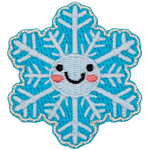 A 12-pointed snowflake has dots for eyes and a big U-shaped smile.