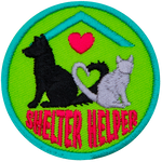 A cat and dog sit facing away from each other. Their tails curve together to make a heart. The words Shelter Helper are at the bottom.