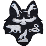 This patch is shaped like a wolf head. A panther and wolf are in the ears, a kite bird, bear, and snake rest in the middle, and a wolf on a rock sits in the snout.