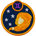 This circular crest has the side profile of two girls surrounded by stars. The sign of Gemini sits above his head.