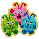 Three creatures smile happily up at the viewer. They are made of fuzzballs with arms, feet, and antennae.