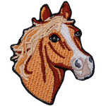 This crest displays the profile of a chestnut horse with a white strip down its forehead to nose.