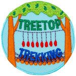 A log bridge and dangling hand-hold rings spans the distance between two trees on this circular Treetop Trekking patch.