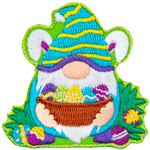 This bunny-ear-wearing gnome holds a basket full of painted eggs to show that he is ready for Easter.