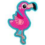 The side view of a kawaii pink flamingo standing on one leg.