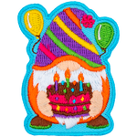 A gnome with a striped hat holds a chocolate cake.