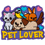 A grey and white cat, brown and white puppy, brown bunny, and blue parrot are on top of the words Pet Lover.