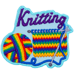 A rainbow yarn ball is being knitted into a square with two needles. The word Knitting is above them.