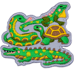A snake, turtle, iguana, and crocodile sit together on this reptile-themed patch. 