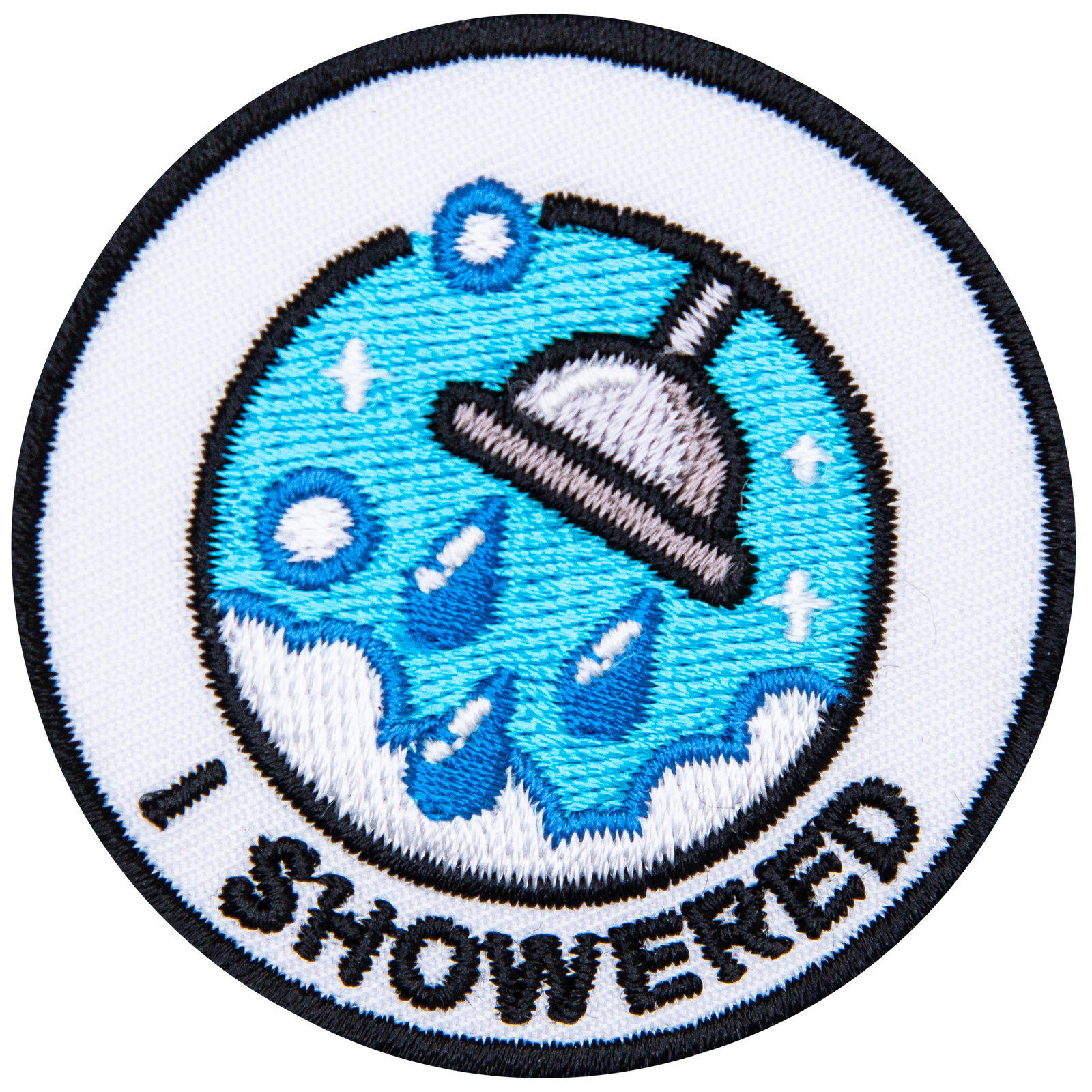 A shower head spraying water and surrounded by steam is above the words I Showered.