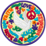 A white dove is surrounded by kind words and flowers.