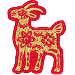 A gold goat with a red outline and floral details on its body.