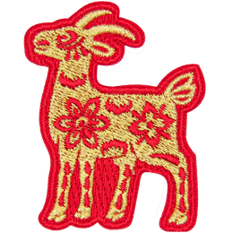 A gold goat with a red outline and floral details on its body.