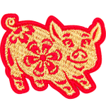 A gold pig in a red outline and detailing.