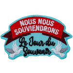 Two doves hold up a banner with the words nous nous souviendrons and Le Jour du Souvenir.