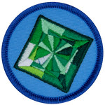 A square emerald on a blue background.