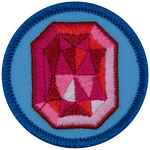 A red ruby on a blue background.