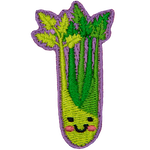 A cluster of celery stalks with a cute face on it.