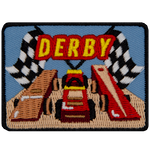Two flags sit on either side of the word Derby and underneath are two go-kart launch tracks.