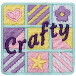 The word Crafty over a quilt-themed badge.
