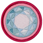 The top of a diamond is on a blue background.