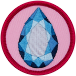 A sapphire surrounded by a ring of yellow on a pink background.