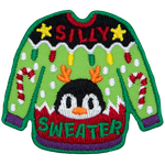 A brightly coloured sweater with the words Silly Sweater on it.