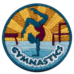 A gymnast in a pink leotard poses above the word Gymnastics.