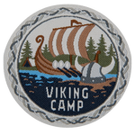A Viking ship is on the water above the words Viking Camp.