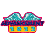 The word Advancement and the number 2023 are under a pair of white wings.