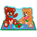 Two teddy bears sit on a picnic blanket eating red and green apples on a clear day.