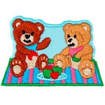 Two teddy bears sit on a picnic blanket eating red and green apples on a clear day.