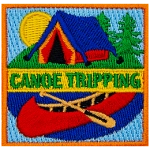 A blue and yellow tent sits behind a red canoe. The words Canoe Tripping are across the middle.