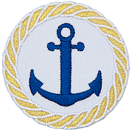 A two pronged, barbed nautical anchor is in the center of this circular crest. A braided rope made of gold thread is embroidered around the edge as a border.