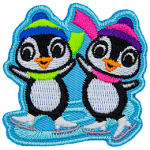 Two penguins skate on a swirl of ice. Both penguins wear winter hats and scarves.