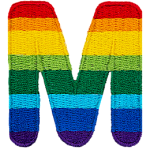 This patch is the letter M in bold font. It is coloured by descending rainbow stripes.