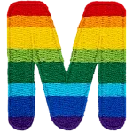 This patch is the letter M in bold font. It is coloured by descending rainbow stripes.