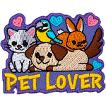 A grey and white cat, brown and white puppy, brown bunny, and blue parrot are on top of the words Pet Lover.