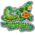A snake, turtle, iguana, and crocodile sit together on this reptile-themed patch. 
