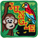 A monkey, parrot, and panther are hiding in jungle foliage. The word Jungle is stitched diagonally down the middle.