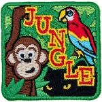 A monkey, parrot, and panther are hiding in jungle foliage. The word Jungle is stitched diagonally down the middle.