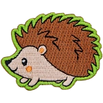 A cute hedgehog faces to the left.