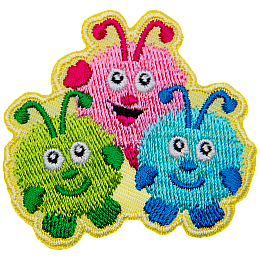 Three creatures smile happily up at the viewer. They are made of fuzzballs with arms, feet, and antennae.
