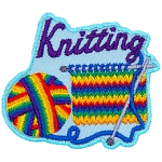 A rainbow yarn ball is being knitted into a square with two needles. The word Knitting is above them.
